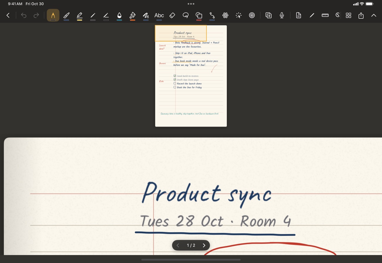 Tabletop mode: page overview above, writing below